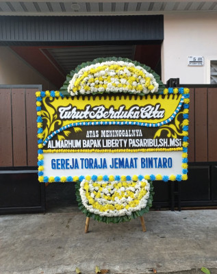 Papan Bunga Duka di Wangurer Barat